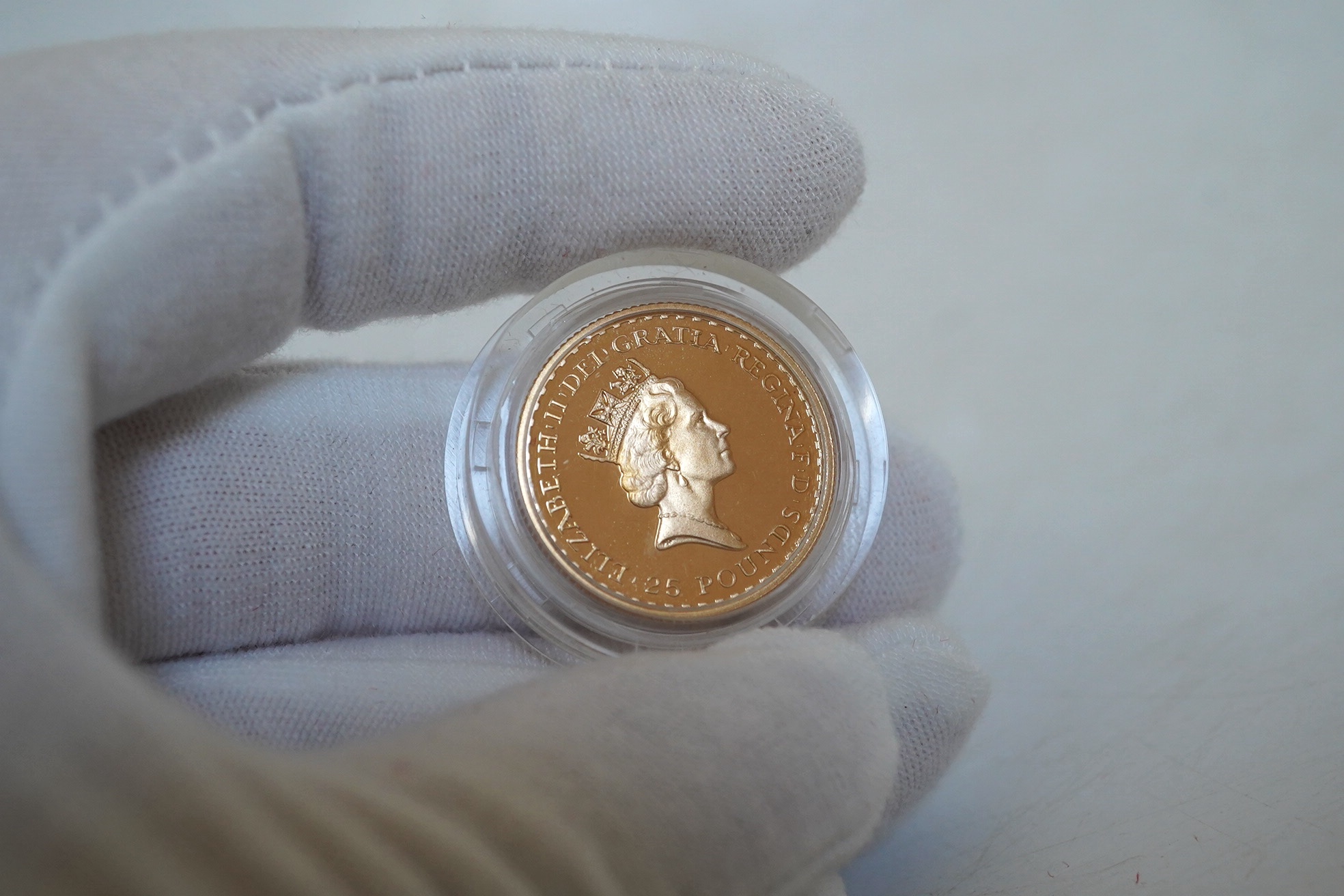 British gold coins, 1987 Royal Mint Britannia 1/4 oz. proof gold £25 coin, in case of issue with certificate